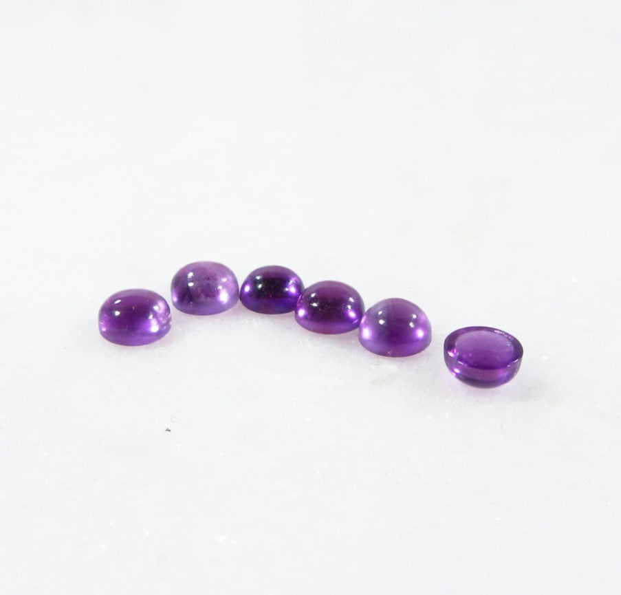 round amethyst gemstone group