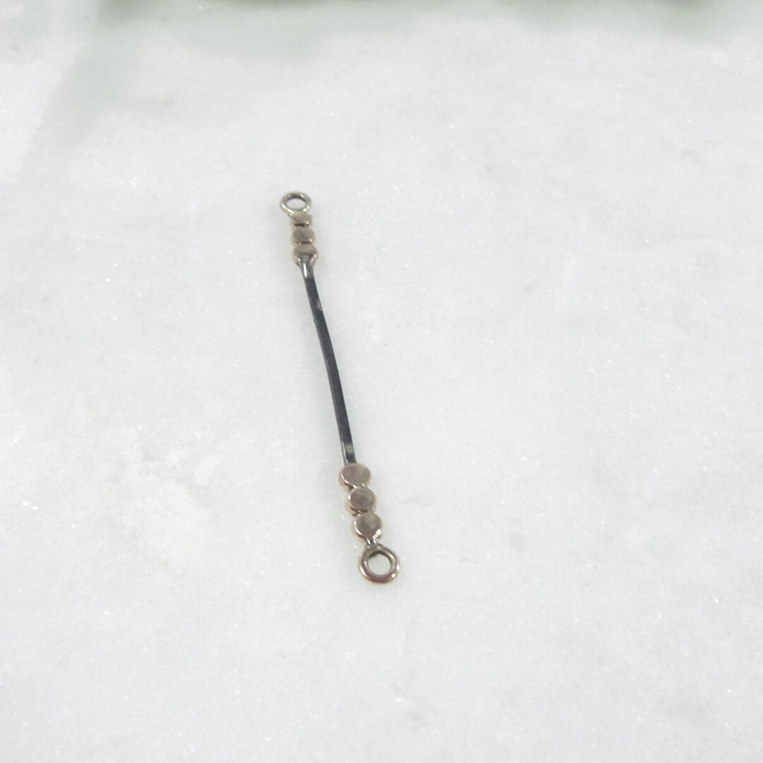 side view oxidized bar with dots