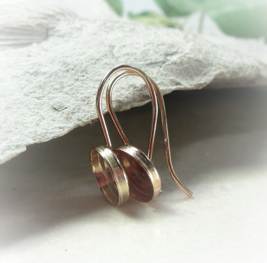yellow gold bezel settings for ears